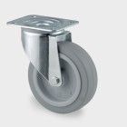 ZWENKWIEL, VORK VAN GEPERST STAAL, VERZINKT, DUBBELE KOGELDRAAIKRANS IN DE ZWENKKOP, WIELAS GESCHROEFD, STOFAFDICHTING, PLAATBEVESTIGING. WIELKERN VAN POLYAMIDE MET NIET-STREPENDE, ELASTISCHE RUBBERBAND, WIELNAAF OP ROLLAGER